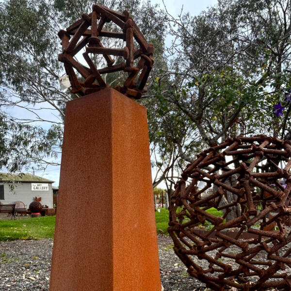 Obelisk-plinth-with-nail-ball